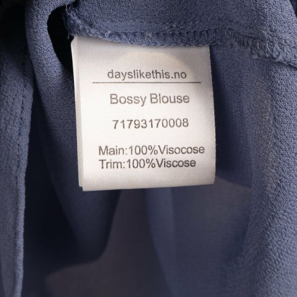 Materialetikett på blus: viskos