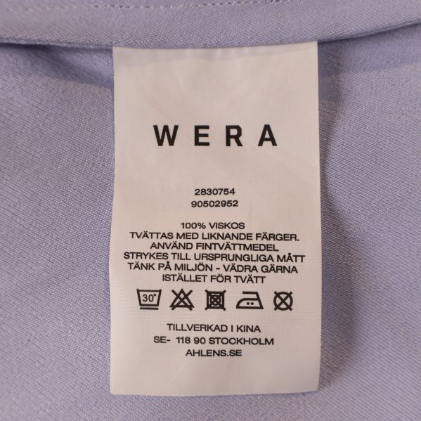 Närbild av WERA materialetikett 100% viskos