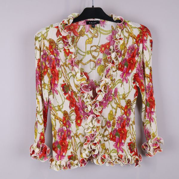 Blus med blommönster och rysch framtill
