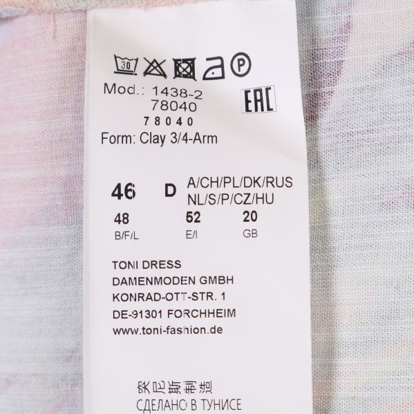 Storleksetikett på färgglad tunika