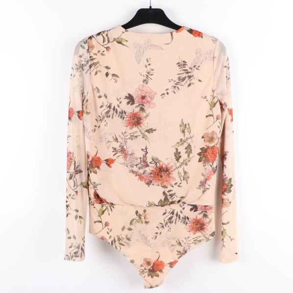 Baksidan av blommig body