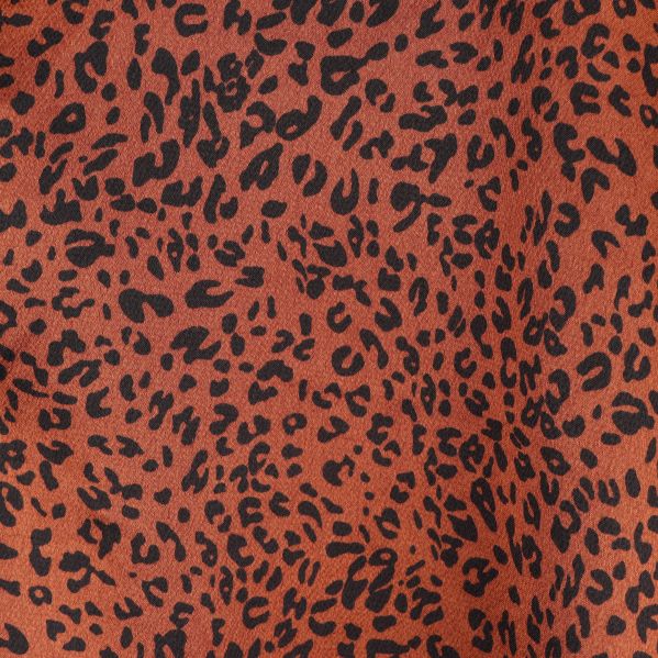 Närbild av leopardmönster på tyget