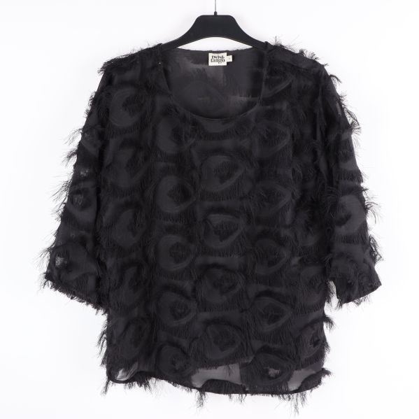 Svart blus med fransar, framifrån