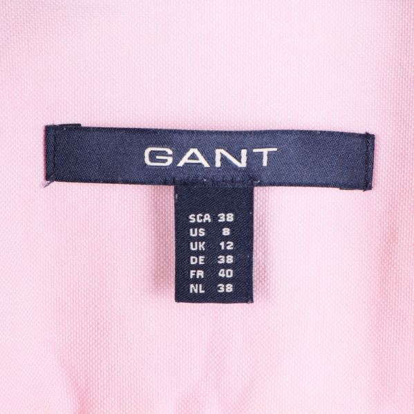 Storleksetikett med:  GANT och storlek