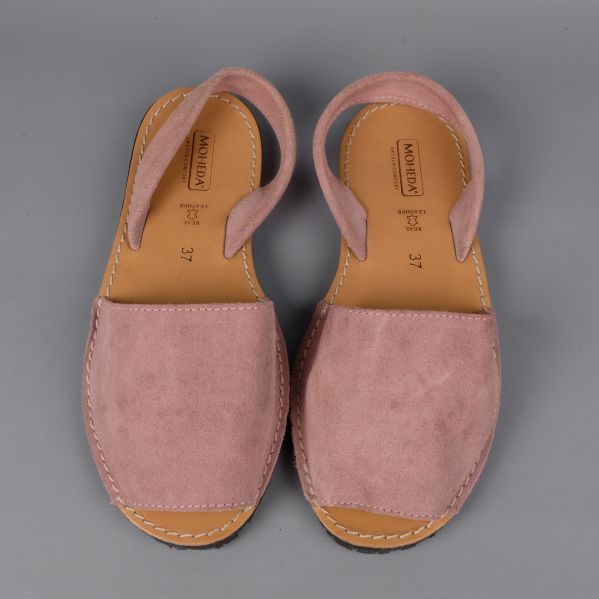 Side view of pink open-toe sandals