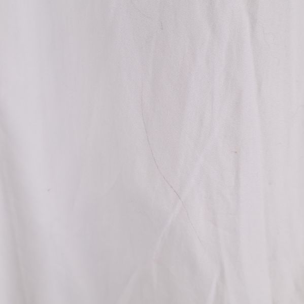 Textur av vit skjorta