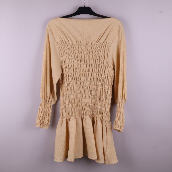 Beige klänning med smock