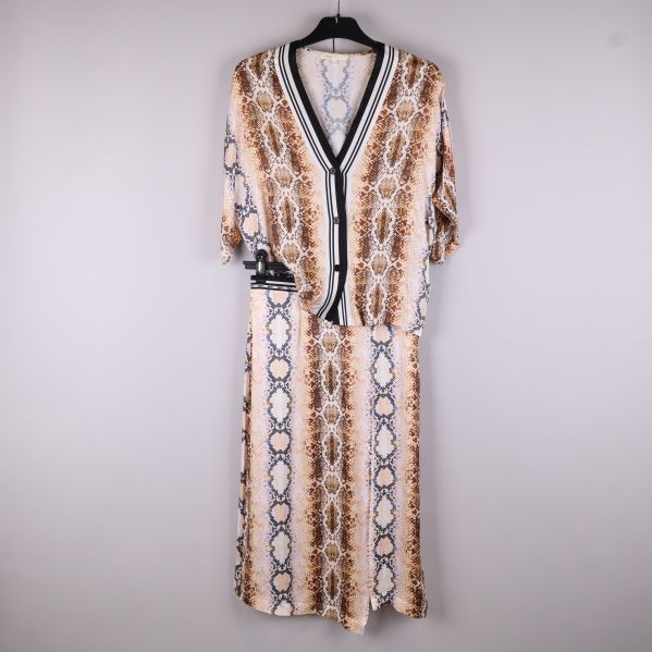 Ormskinnsmönstrat set med topp och kjol 