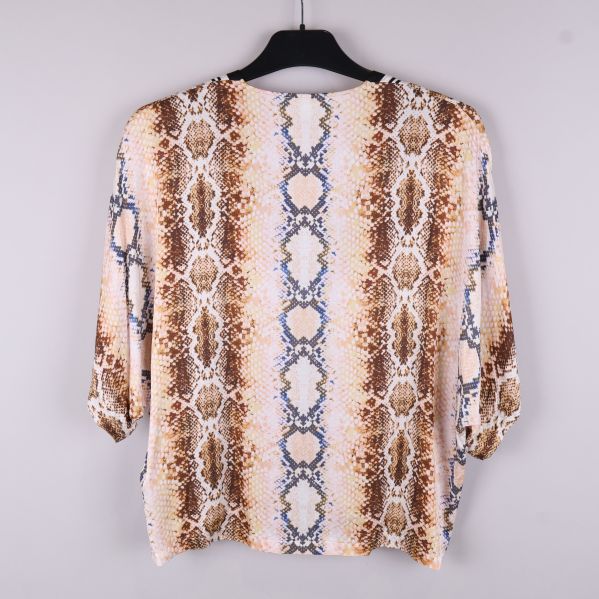 Baksidan av topp med ormskinnsmönster