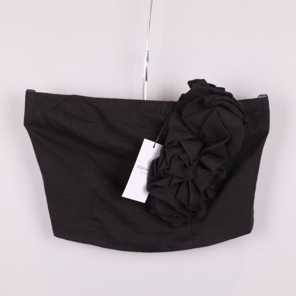 Svart bustier fram