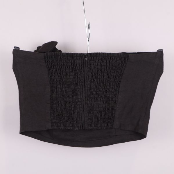 Svart bustier bakifrån med resår