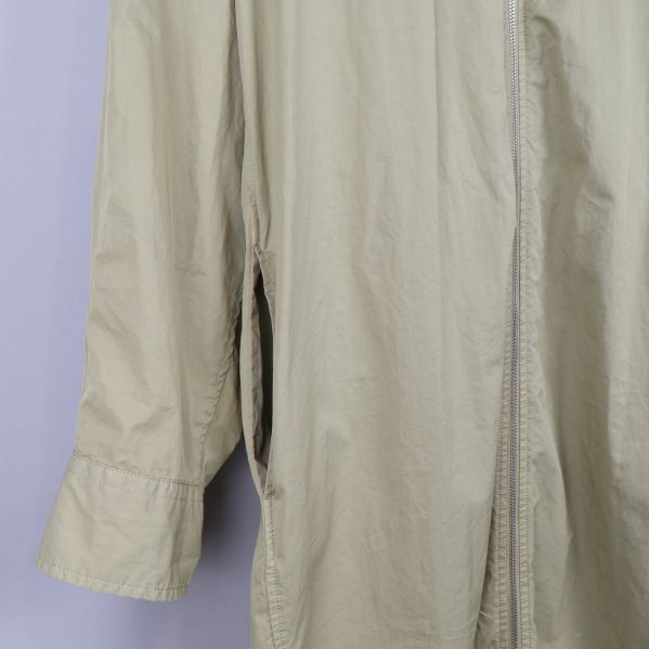 Närbild av ficka på trenchcoat