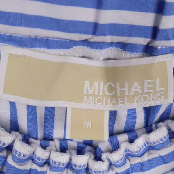 Michael Kors etikett på topp