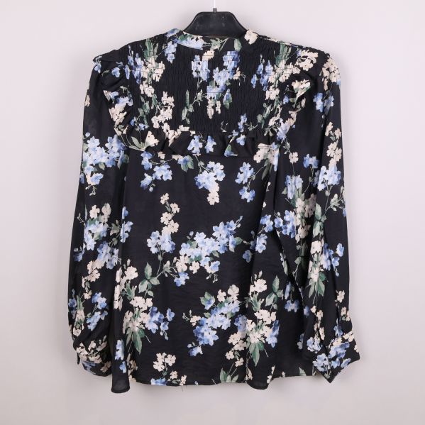 Svart blommig blus baksida