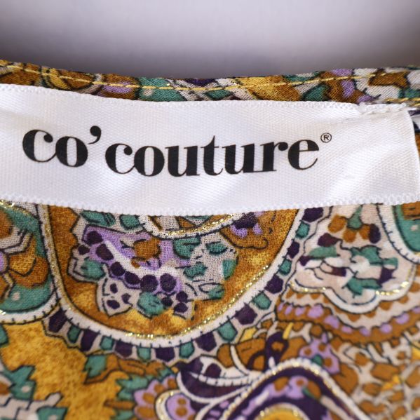 Co'couture märkeslapp på klänning