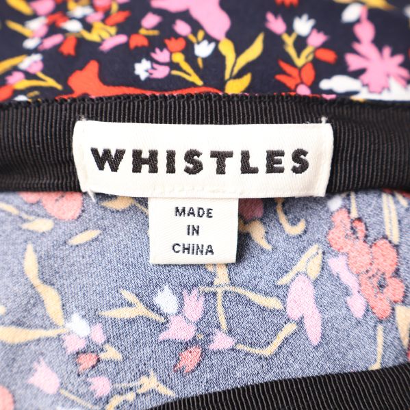 Whistles etikett på insidan av kjolen