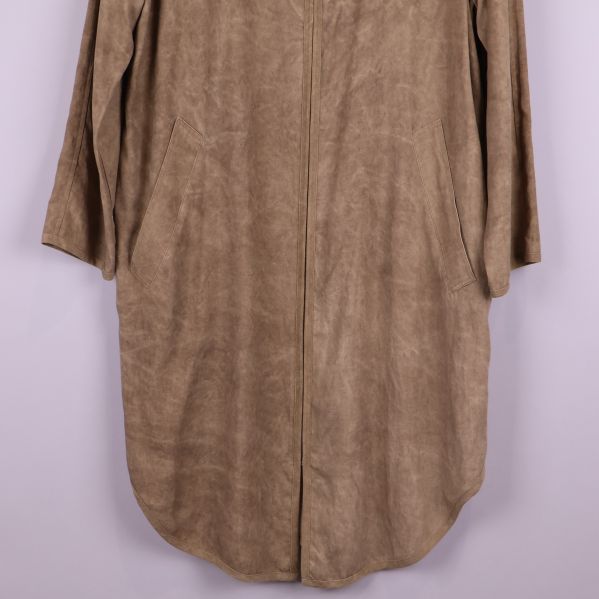 Underdel av beige kappa med fickor