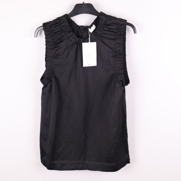 Framsidan av blus
