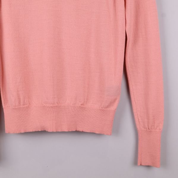 Rosa tröja med ribbad kant