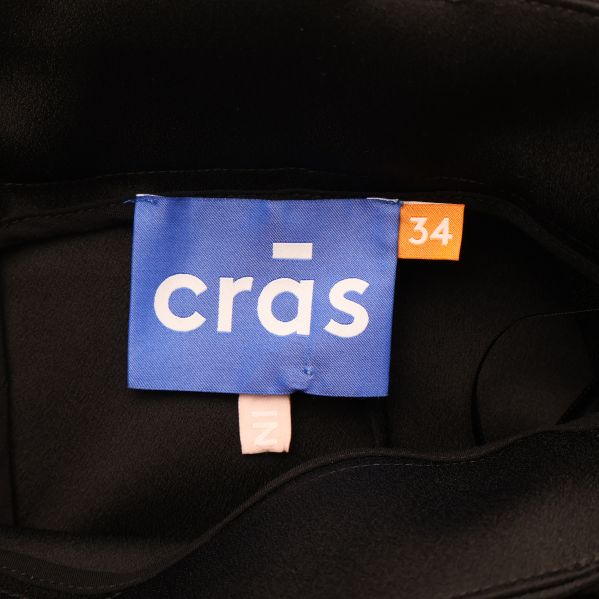 Märke Crās med storleksetikett 34