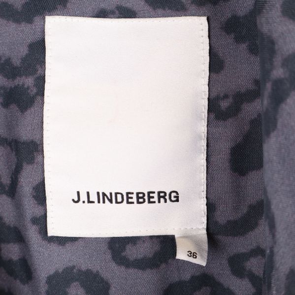 Etikett med J. Lindeberg och storlek