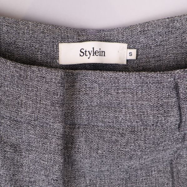 Närbild på Stylein-etikett och storlek small