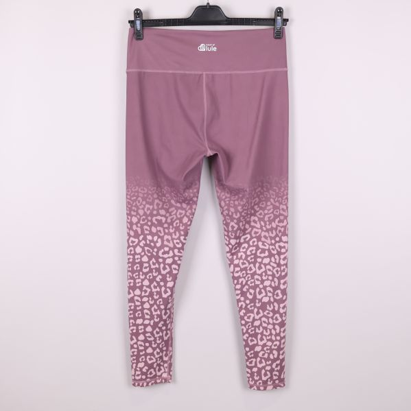 Baksida av tights med bred midja och leopardmönster