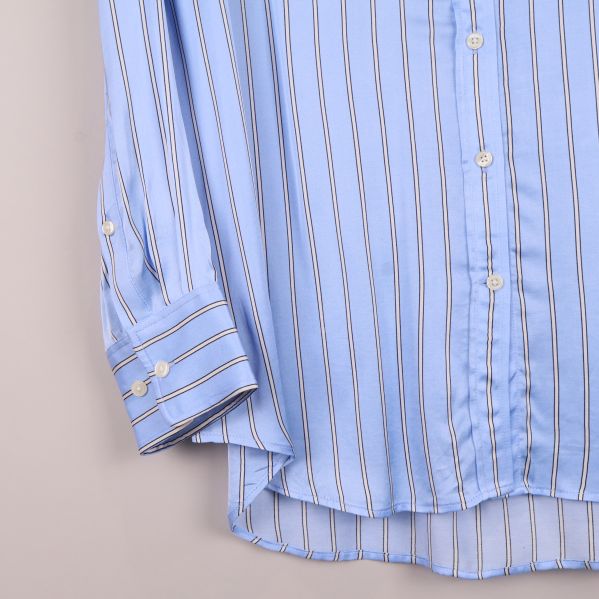 Skjortärm med dubbla knappar och randigt tyg