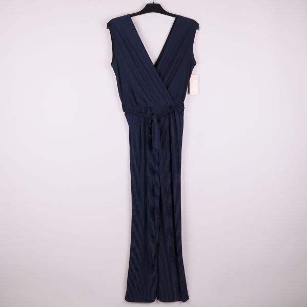 Marinblå byxdress med djup v-ringning