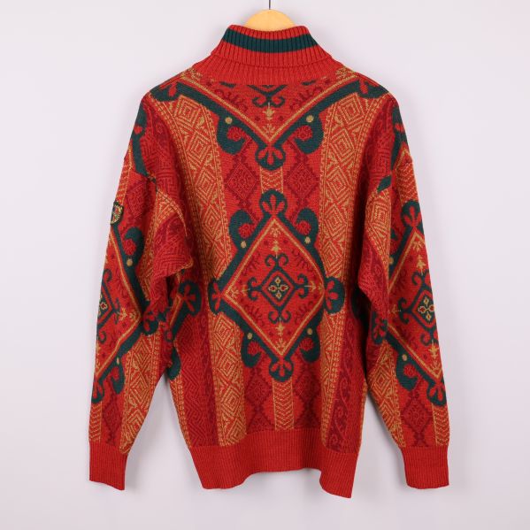 Baksida av stickad tröja med mönster