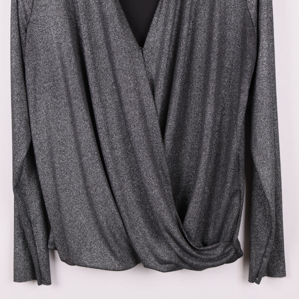 Framöverläggning detalj som liknar omlott