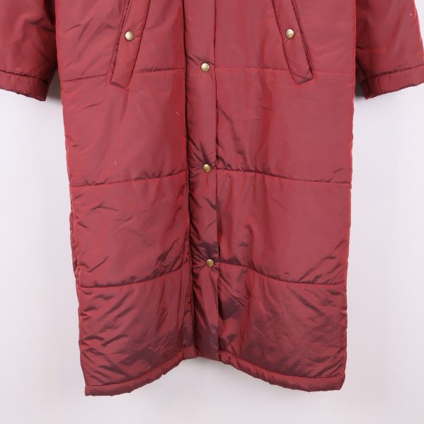 Nederdelen av den quiltade dunkappan