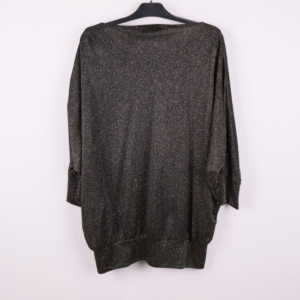 Baksidan av svart glittrande butterfly blus