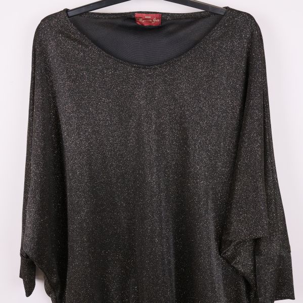 Närbild på toppens glittrande textur och ringning