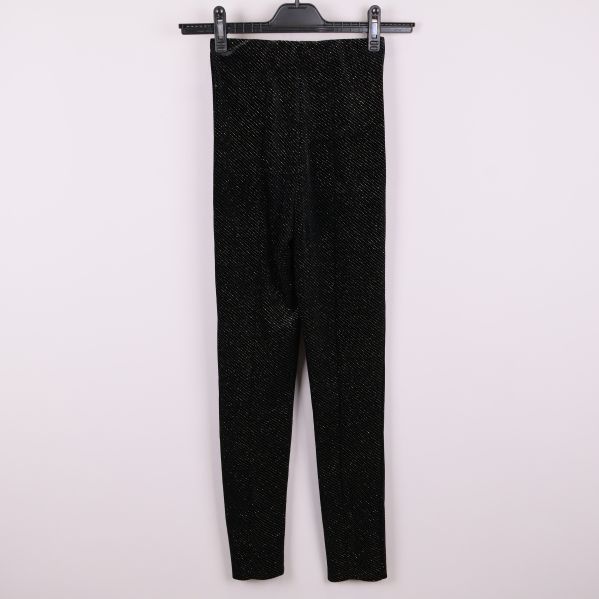 Baksida av svarta glittriga tights