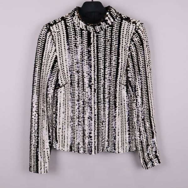 Paljettblus med svarta och vita ränder framifrån