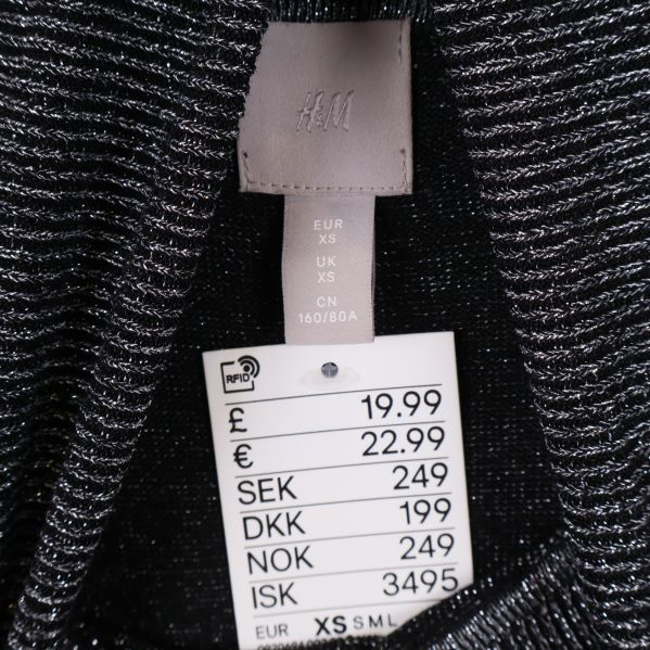 Storleksetikett XS och prislapp