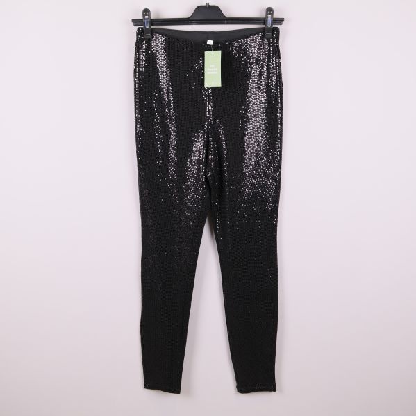 Svarta glittertights med paljetter framifrån på galge
