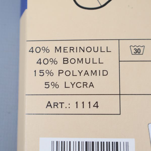 Materialkomposition: 40% merinoull, 40% bomull, 15% polyamid, 5% lycra