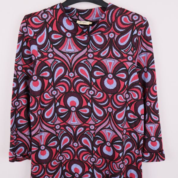 Överdel av klänning med lång ärm och starkt mönster