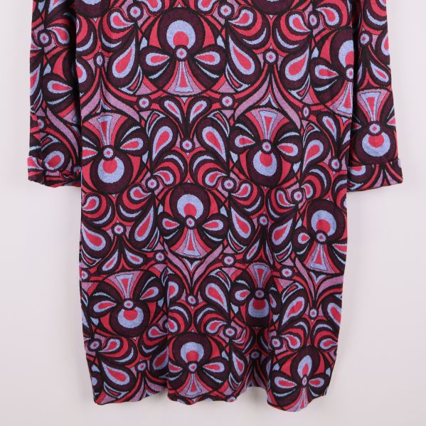 Nedre delen av klänning med rundad fåll