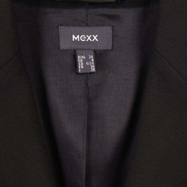 Kavajens inneretikett med Mexx logga och storleksinfo