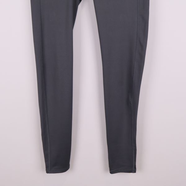 Närbild på tightsens nedre del utan synliga detaljer