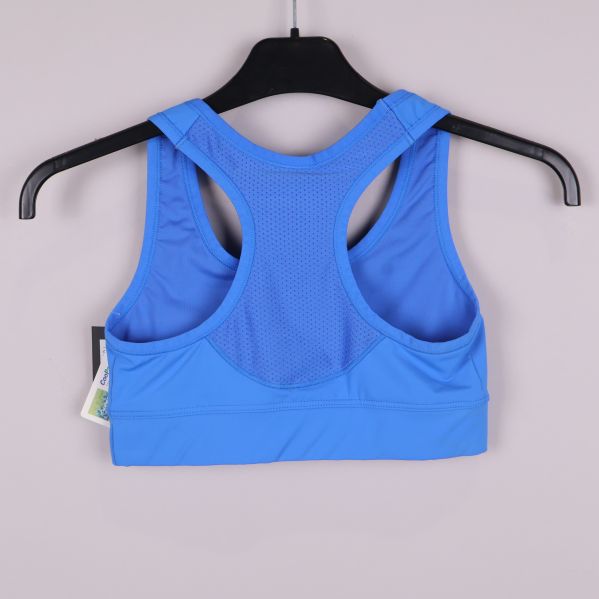 Baksida av blå sport-bh med meshpanel