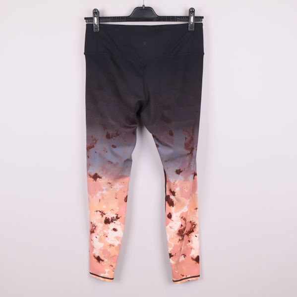 Sporttights med mönster i svart och pastellfärger bakifrån