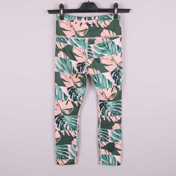 Leggings med grönt och rosa bladmönster bakifrån
