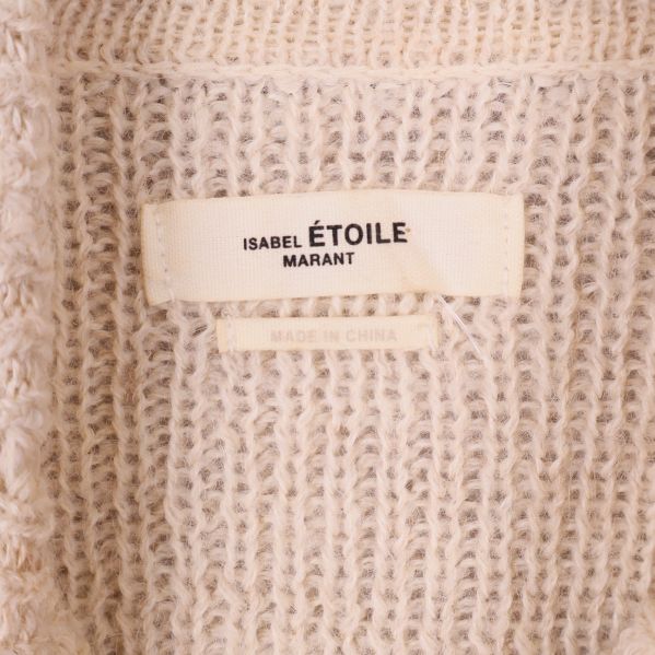 Nära bild på etikett Isabel Étoile Marant inuti tröjan