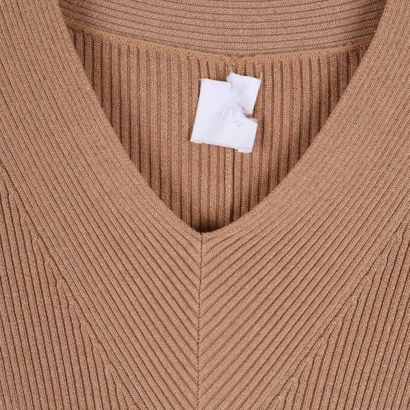 Detajl av V-ringning och textur