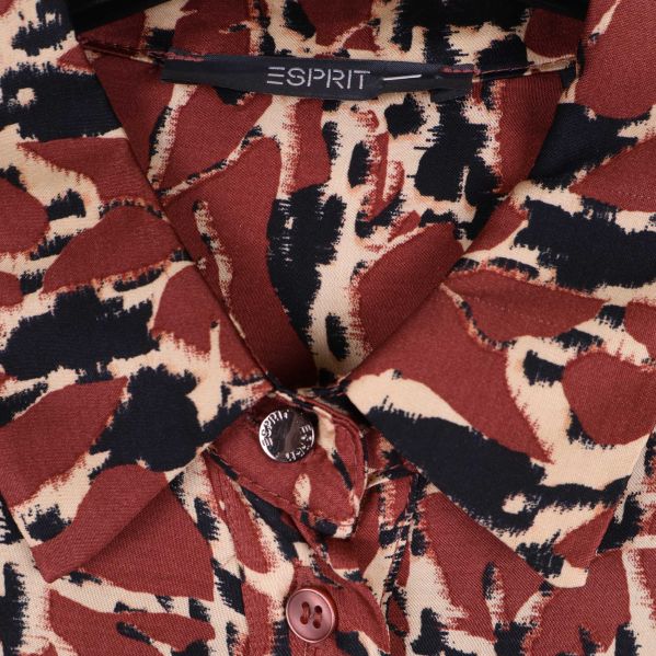 Esprit-logga och knappdetalj