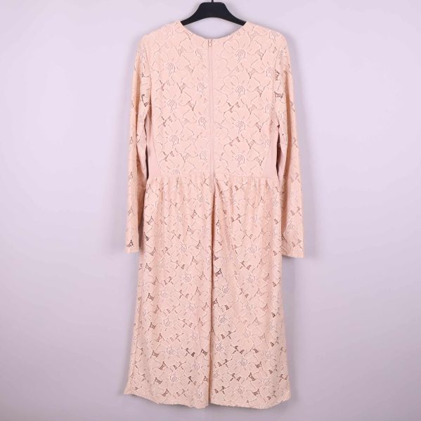 Rygg med dragkedja och spets